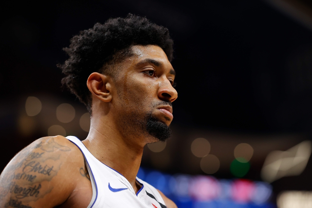 (FILES) In this file photo Christian Wood #35 of the Detroit Pistons reacts after drawing a foul on a basket against the Atlanta Hawks in the first half at State Farm Arena on January 18, 2020 in Atlanta, Georgia. . / AFP / Kevin C. Cox 