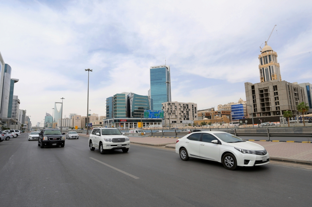 General view shows the cars on the street, after curfew lifted, which was imposed to prevent the spread of the coronavirus disease (COVID-19), in Riyadh, Saudi Arabia, March 24, 2020. REUTERS/Ahmed Yosri