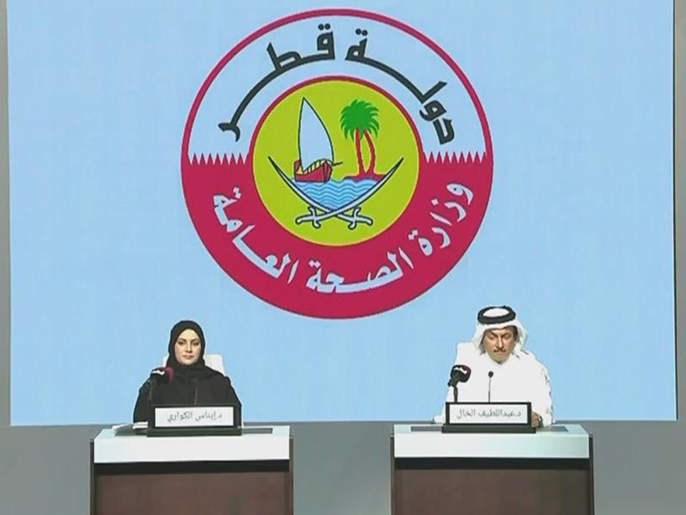 Dr. Abdul Latif Al Khal (right), Chair of the National Strategic Group on COVID-19, addressing a press conference on Qatar TV yesterday. Also seen  is Dr. Einas Al Kuwari, Chair of the Department of Laboratory Medicine and Pathology at Hamad Medical Corpo