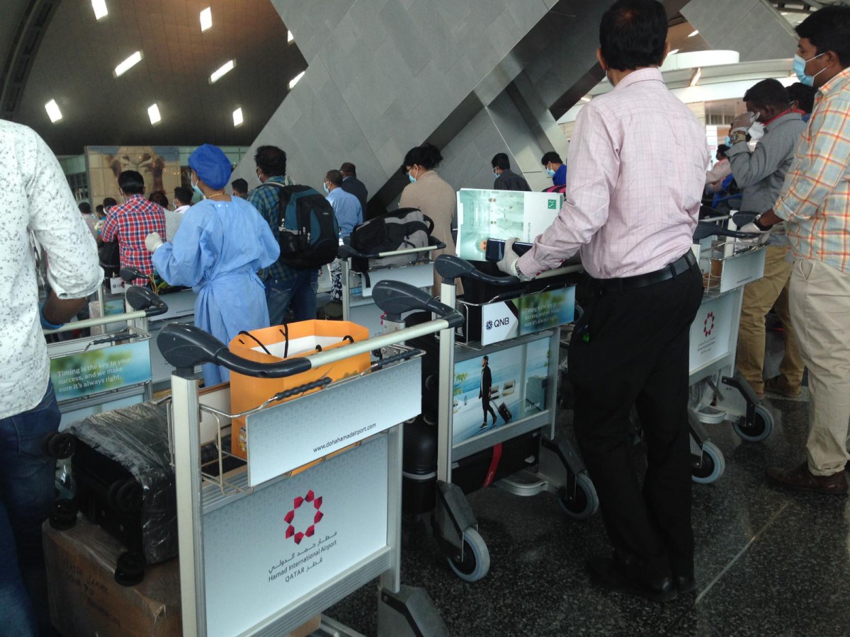 People waiting to check into the Doha-TVM flight which left today.