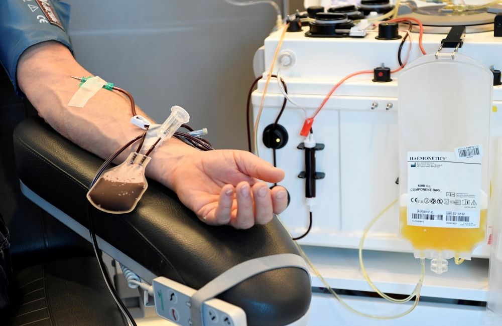 File photo of a person donating blood plasma in Amsterdam, Netherlands used for representation. REUTERS/Piroschka van de Wouw