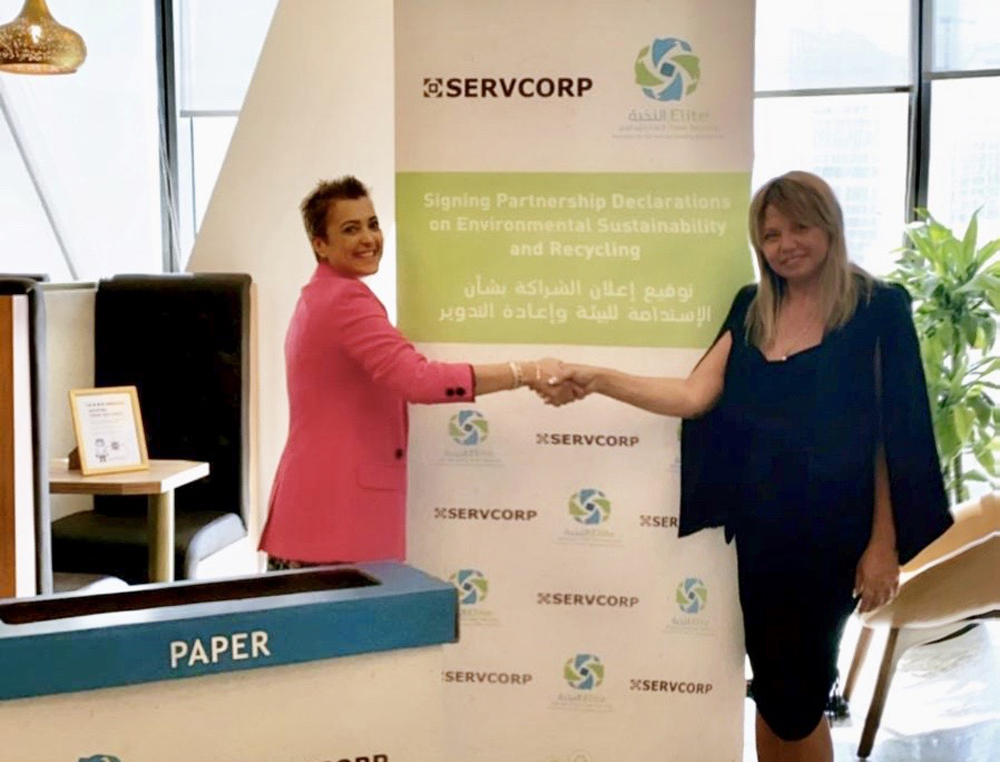 Fabienne Moukheiber Hajjar (left), Senior Manager of Servcorp, and Catina Aghayan, Communication Adviser of Elite Paper Recycling (EPR), after signing the MoU.