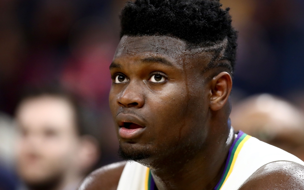 In this file photo taken on February 23, 2020, Zion Williamson of the New Orleans Pelicans sits on the bench during their game against the Golden State Warriors in San Francisco, California. Ezra Shaw/Getty Images/AFP