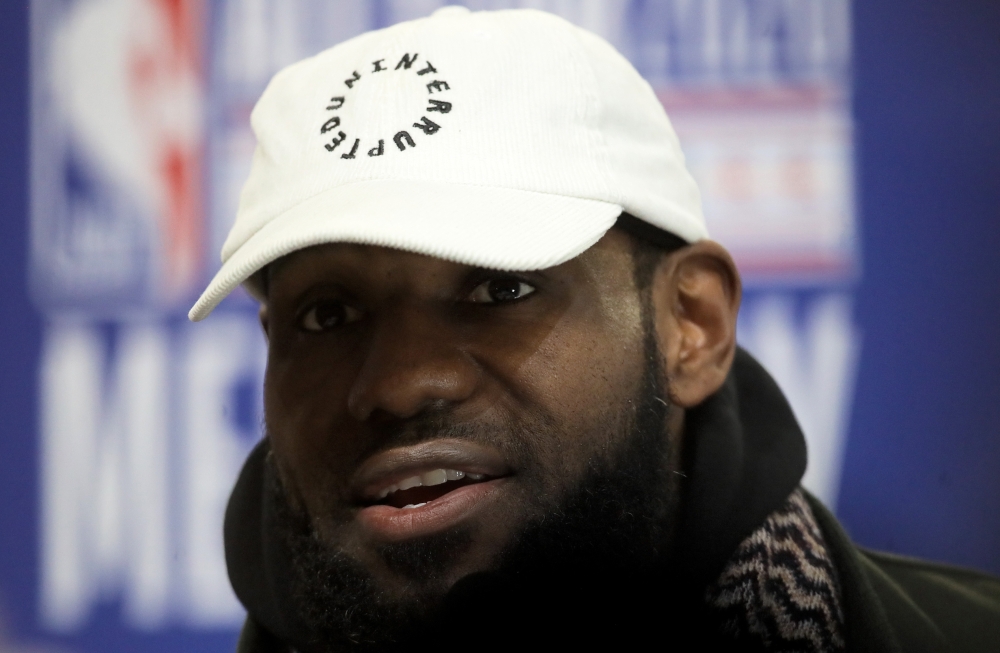 In this file photo LeBron James of the Los Angeles Lakers speaks to the media during 2020 NBA All-Star - Practice & Media Day at Wintrust Arena on February 15, 2020 in Chicago, Illinois. A rare James trading card from his rookie season in the NBA with the