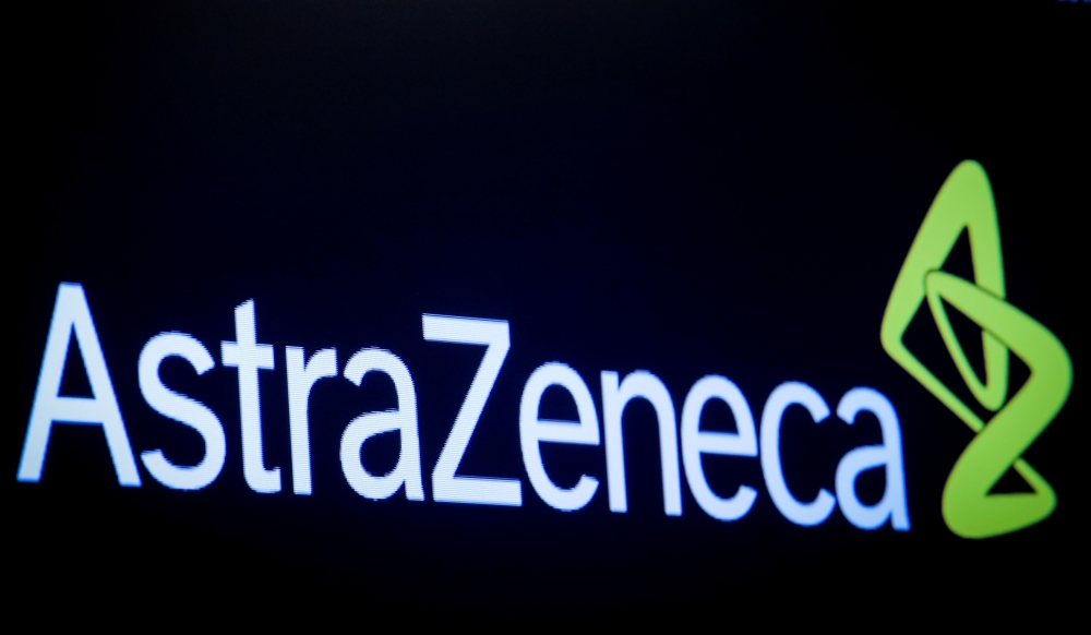 The company logo for pharmaceutical company AstraZeneca is displayed on a screen on the floor at the New York Stock Exchange, U.S., April 8, 2019. REUTERS/Brendan McDermid/File Photo
