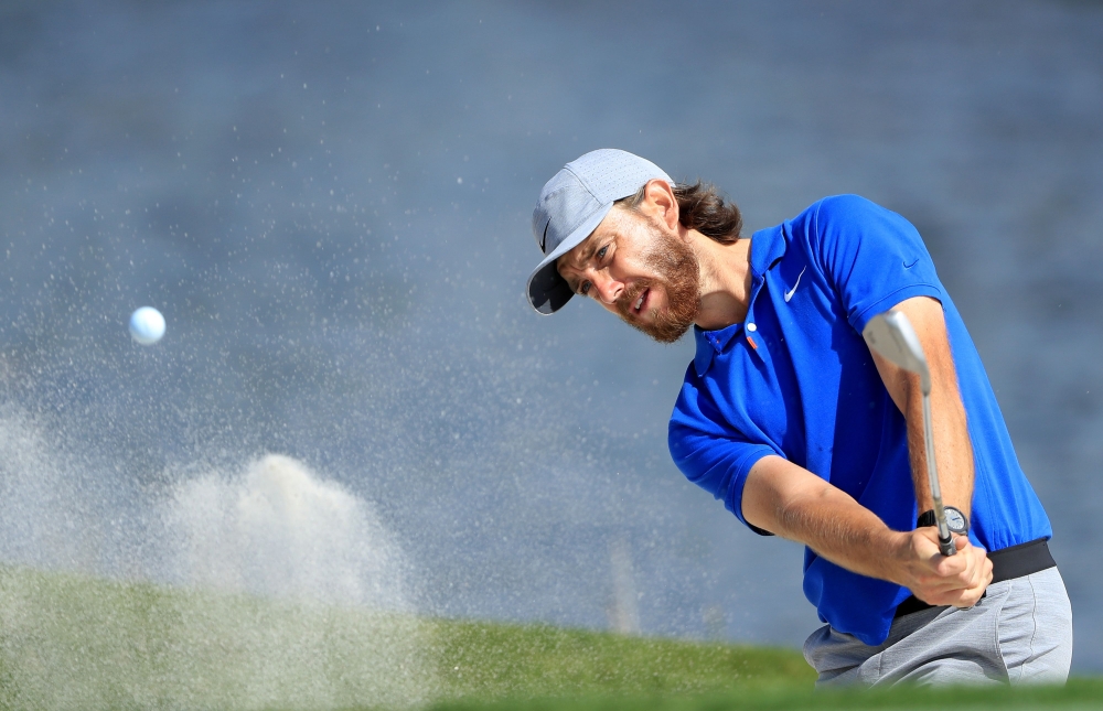 In this file photo taken on February 25, 2020, Tommy Fleetwood of England hits a shot during a practice round prior to the Honda Classic at PGA National Resort and Spa in Palm Beach Gardens, Florida.  / AFP / GETTY IMAGES NORTH AMERICA / SAM GREENWOOD