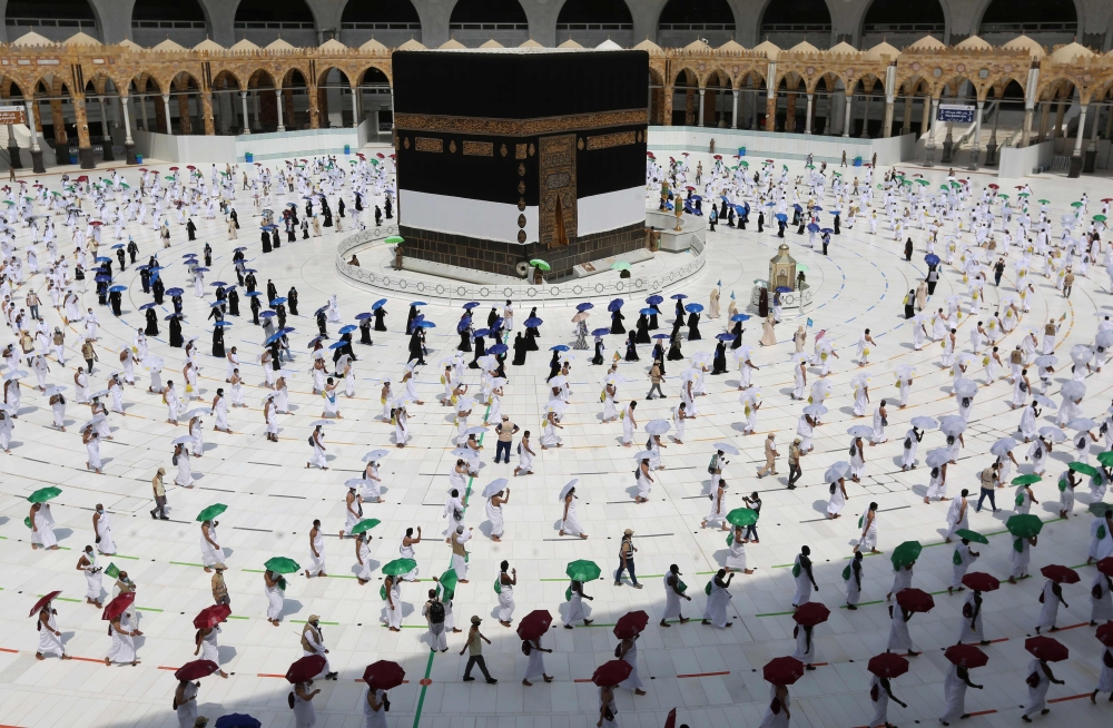 Pilgrims circumambulating around the Kaaba, Islam's holiest shrine, at the centre of the Grand Mosque in the holy city of Mecca, at the start of the annual Muslim Hajj pilgrimage. AFP 