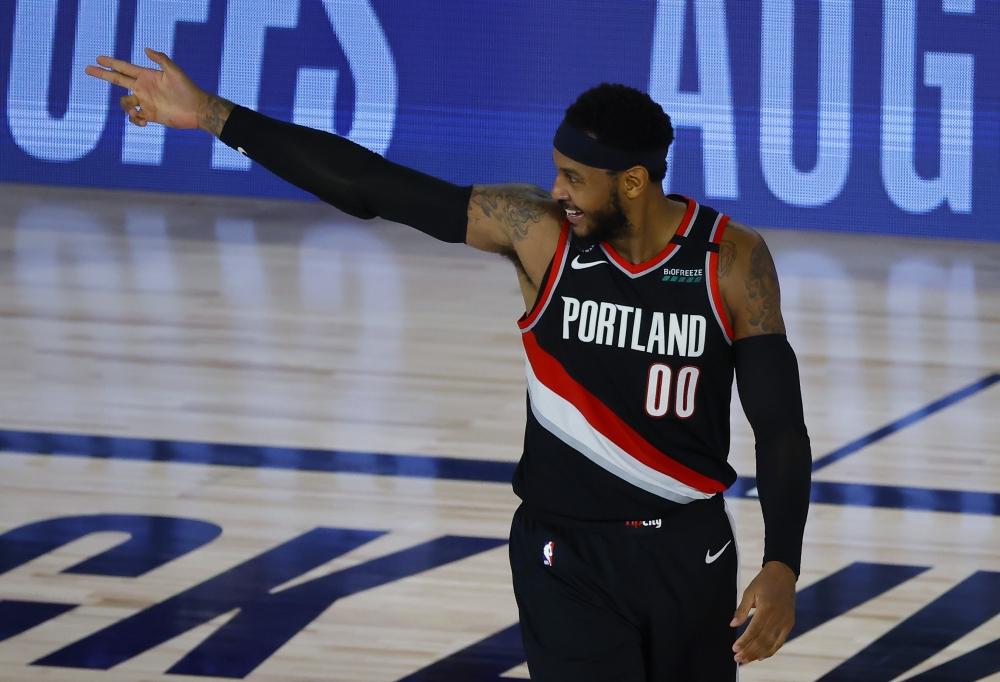 Portland Trail Blazers celebrates a three point shot against the Memphis Grizzlies during the fourth quarter in the Western Conference play-in game one at The Field House. Kevin C. Cox/Pool Photo