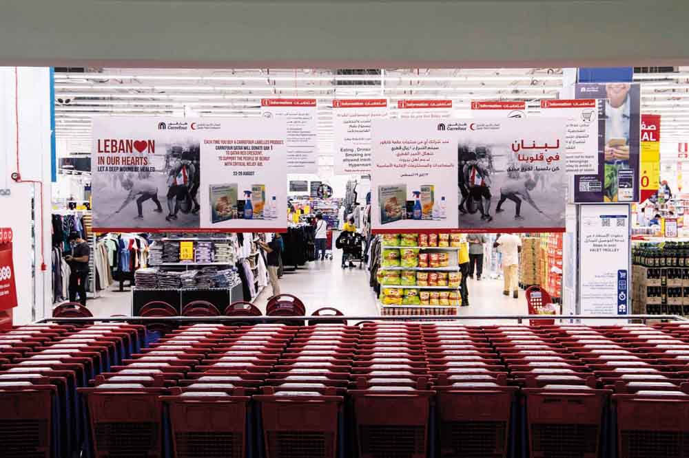 Campaign posters to support victims of Beirut blast at Carrefour Qatar.