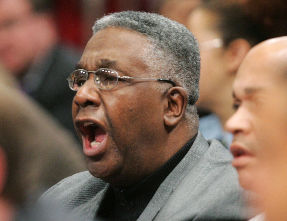 In this file photo former head coach John Thompson II of the Georgetown Hoyas shouts from the stands as his former team takes on the Connecticut Huskies during the quaterfinal round of the Big East Men's Basketball Championship on March 10, 2005 at Madiso