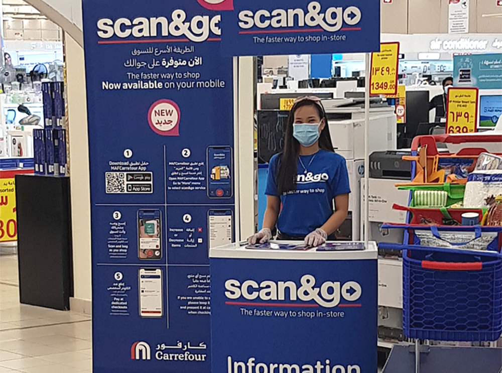 An information desk for Scan&Go Mobile service at one of Carrefour Qatar outlets.