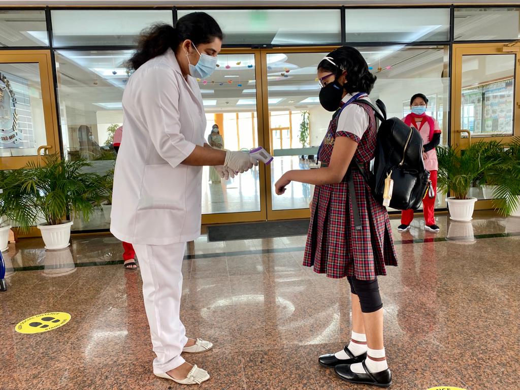 Temperatures check before entering the school is just one of the precautionary measure. Pic: Qassim Rahmatullah / The Peninsula 