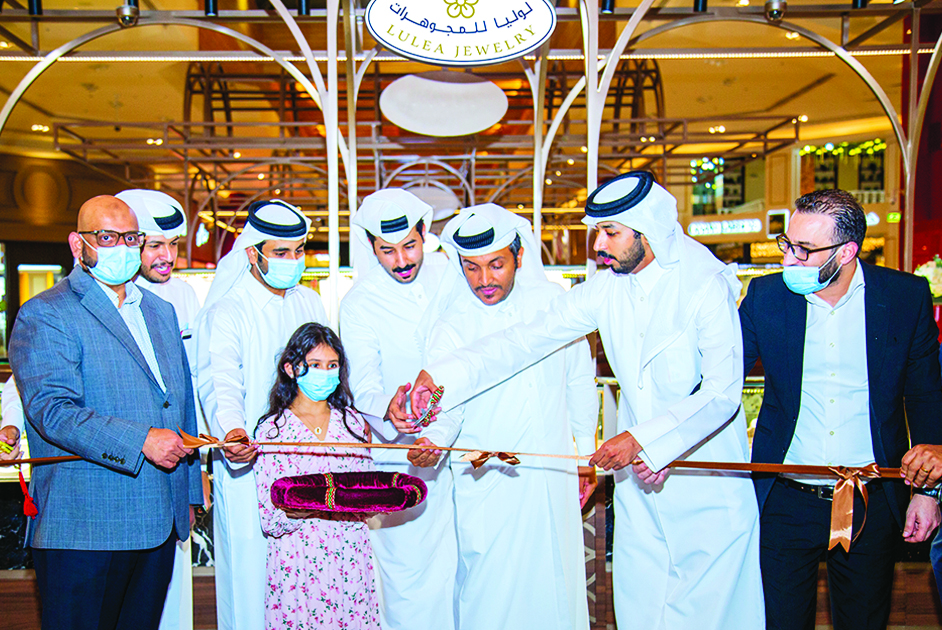 Feroz Moideen, CEO of Hyatt Plaza Mall, and Ali Ahmed Al Korbi, Manager of Lulea Jewelry Company, with other officials during the opening of the Lulea Jewelry. 