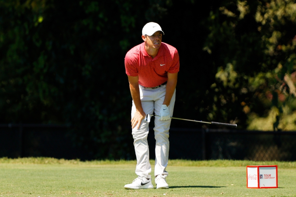 Rory McIlroy of Northern Ireland reacts to his shot from the second tee during the final round of the TOUR Championship at East Lake Golf Club on September 07, 2020 in Atlanta, Georgia. (Sam Greenwood/Getty Images/AFP)