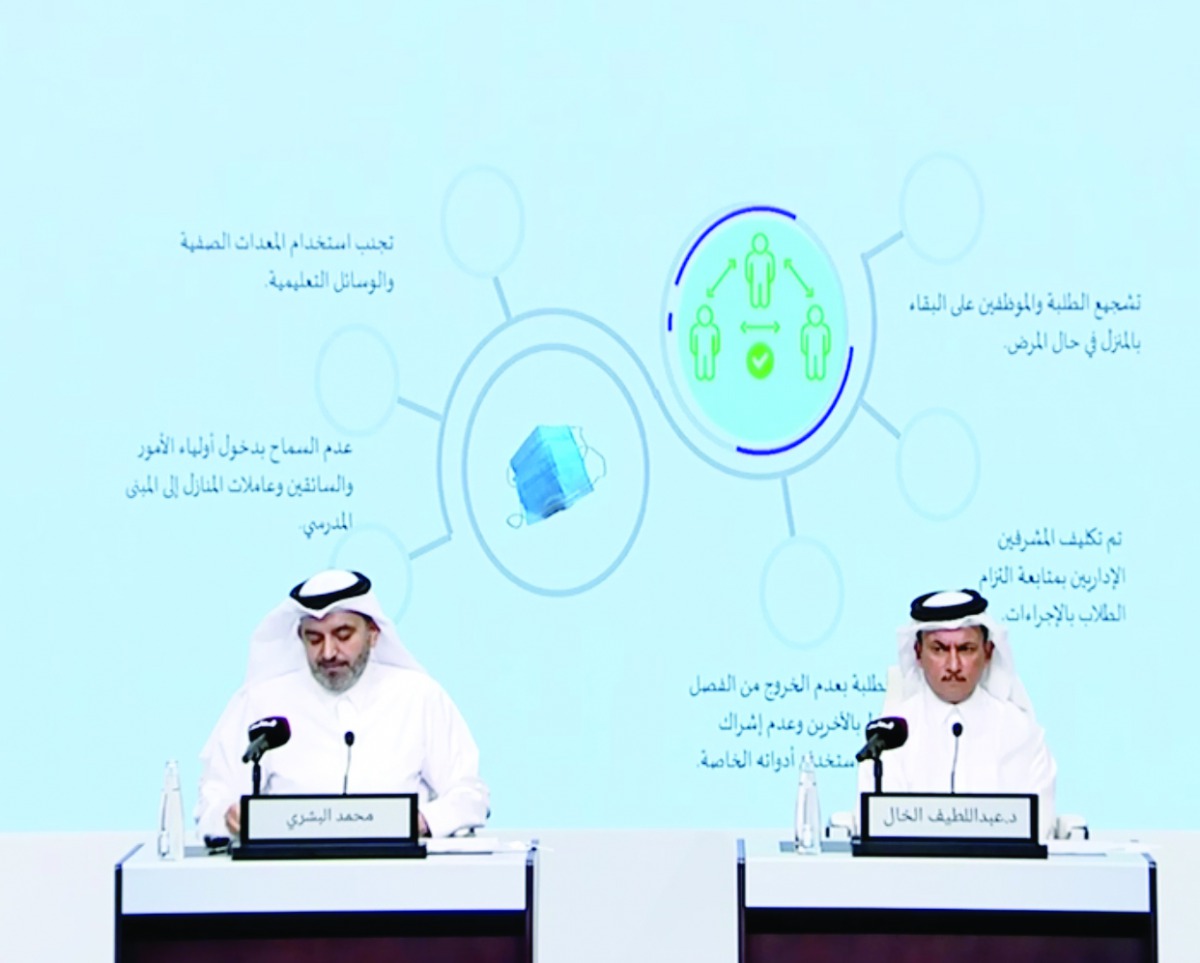 Chair of the National Strategic Group on COVID-19, Dr. Abdullatif Al Khal (right); and Adviser to the Minister of Education and Higher Education, Mohamad Al Bashri, addressing a press conference on Qatar TV, yesterday. 