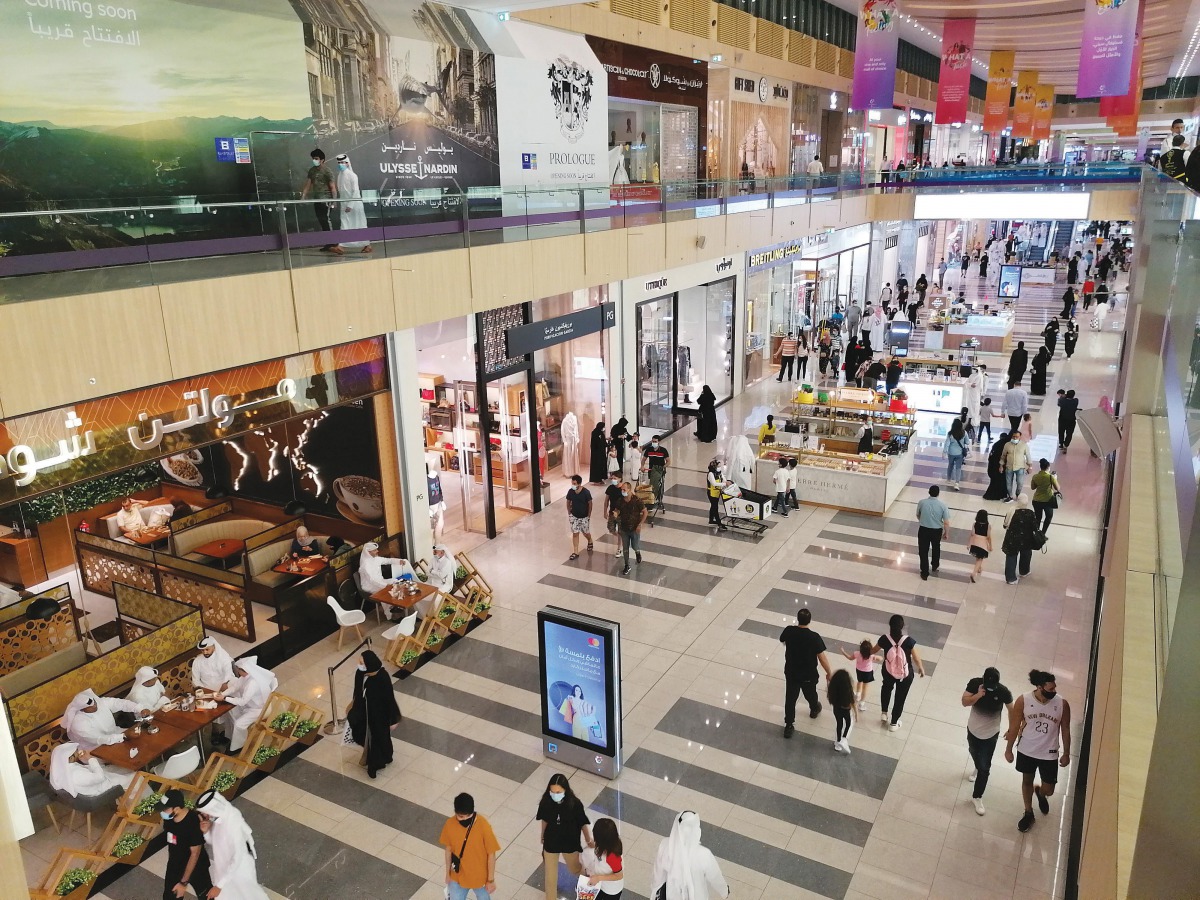 Shoppers enjoying with family and friends at City Center (left), and Doha Festival City.  Pics: Salim Matramkot/The Peninsula