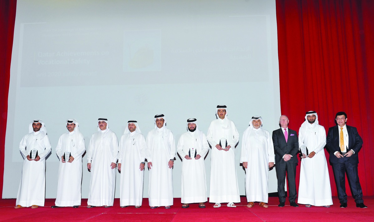 Assistant Undersecretary for Services Affairs at the Ministry of Municipality and Environment H E Ahmed Al  Sada, with awardees and other officials during the launch of Qatar Achievements on Vocational Safety and 2020 Safety Award held at the Sheraton Gra