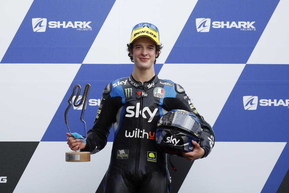 SKY Racing Team VR46's Celestino Vietti poses with a trophy on the podium as he celebrates after winning the Moto3 race. REUTERS/Stephane Mahe