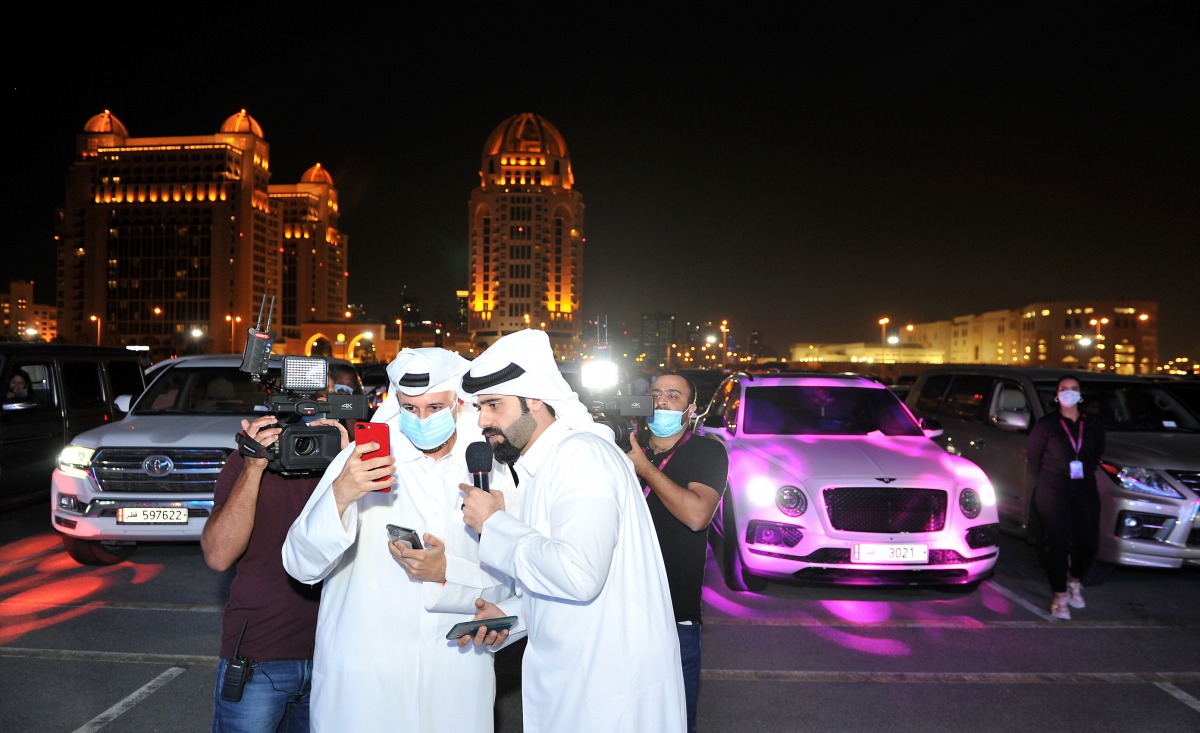 Qatari social media influencers Abdullah Al Ghafri and Hussain Al Sada conducted a mini quiz competition based on iPhone models during the livestream of Apple keynote speech organised by Starlink at Katara in Doha on Tuesday evening. Pic: Salim Matramkot/