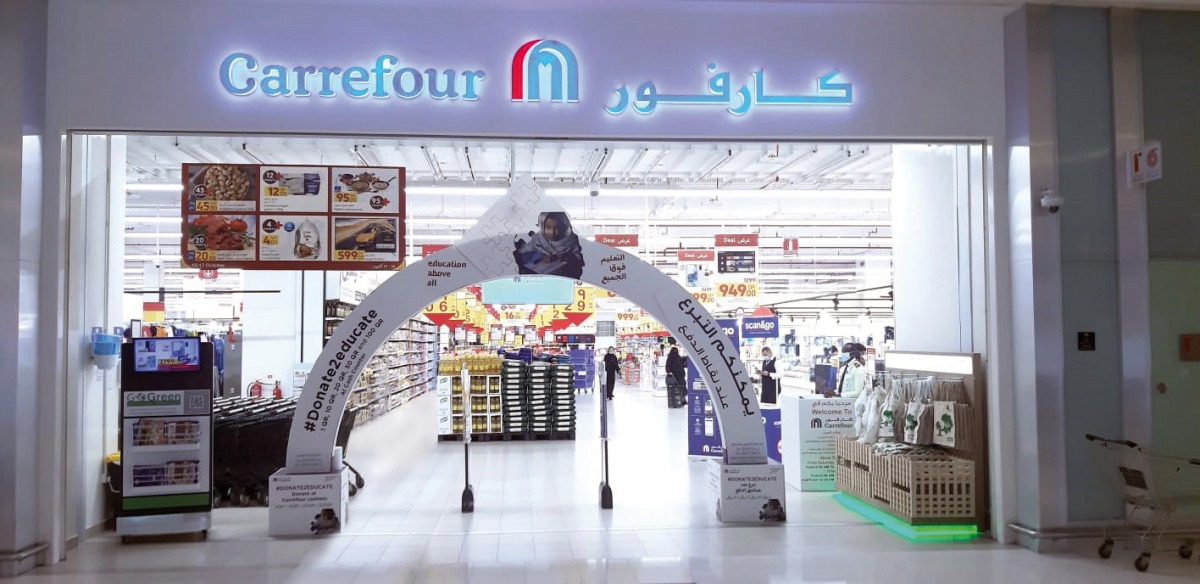  A display board of the fundraising campaign at Carrefour Qatar.