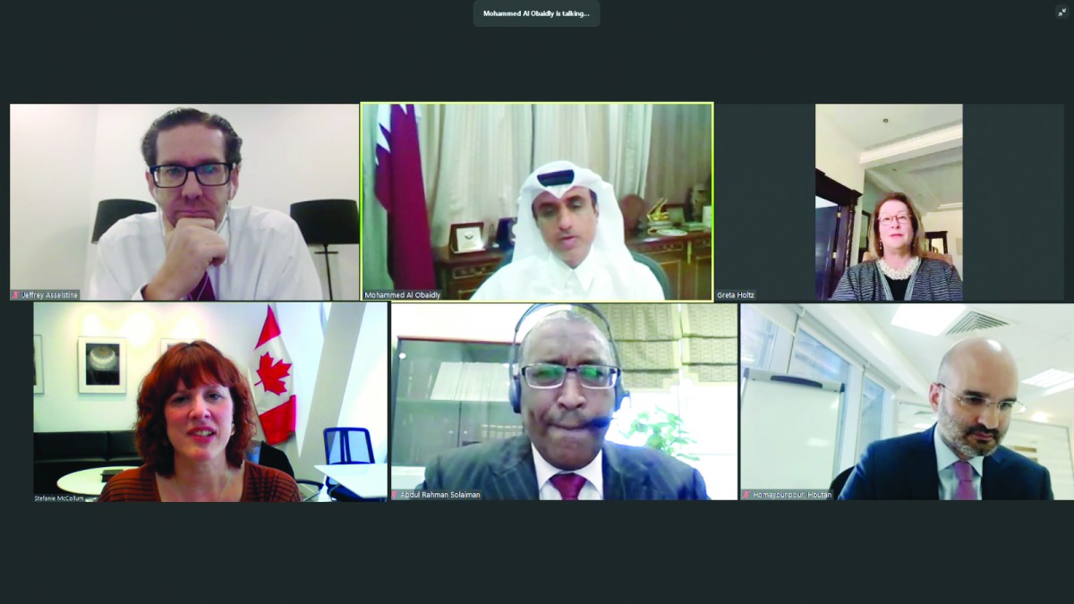 Assistant Undersecretary for Labour Affairs, H E Mohamed Hassan Al Obaidli, with ambassadors and representatives of ILO and Qatar Chamber during the webinar.