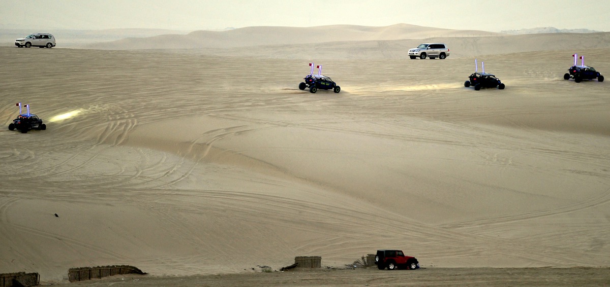 People enjoy dune bashing at Sealine. Photo credit: Abdul Basit/The Peninsula