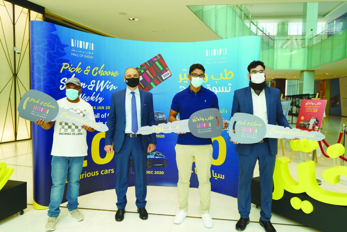 Mall of Qatar General Manager Emile Sarkis with the winners.