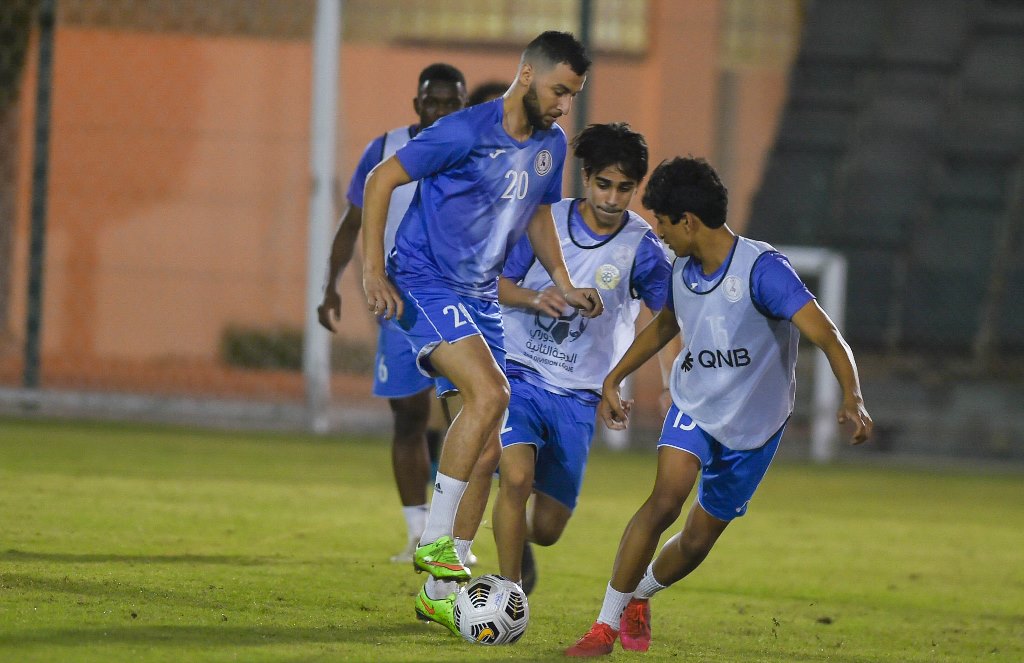 Al Markhiya's players in action during a training session, yesterday