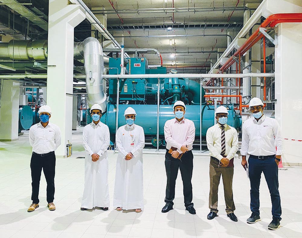 Director of District Cooling Services Department, Eng. Abdulaziz Al Hammadi, with engineers visiting District Cooling Plant in the Education City Stadium.