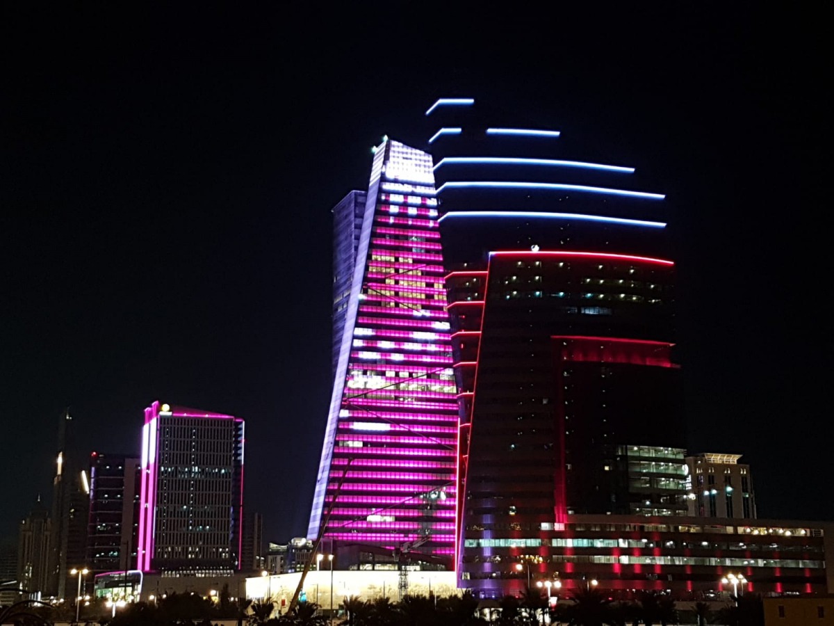 A building in Lusail City illuminated in Qatari national colours as part of National Day celebrations. Pic: Abdul Basit / The Peninsula 