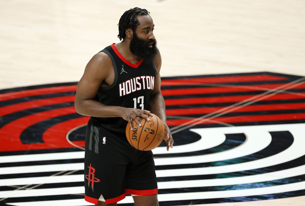 PORTLAND, OREGON - DECEMBER 26: James Harden #13 of the Houston Rockets dribbles during the second quarter against the Portland Trail Blazers at Moda Center on December 26, 2020 in Portland, Oregon. Steph Chambers/Getty Images/AFP