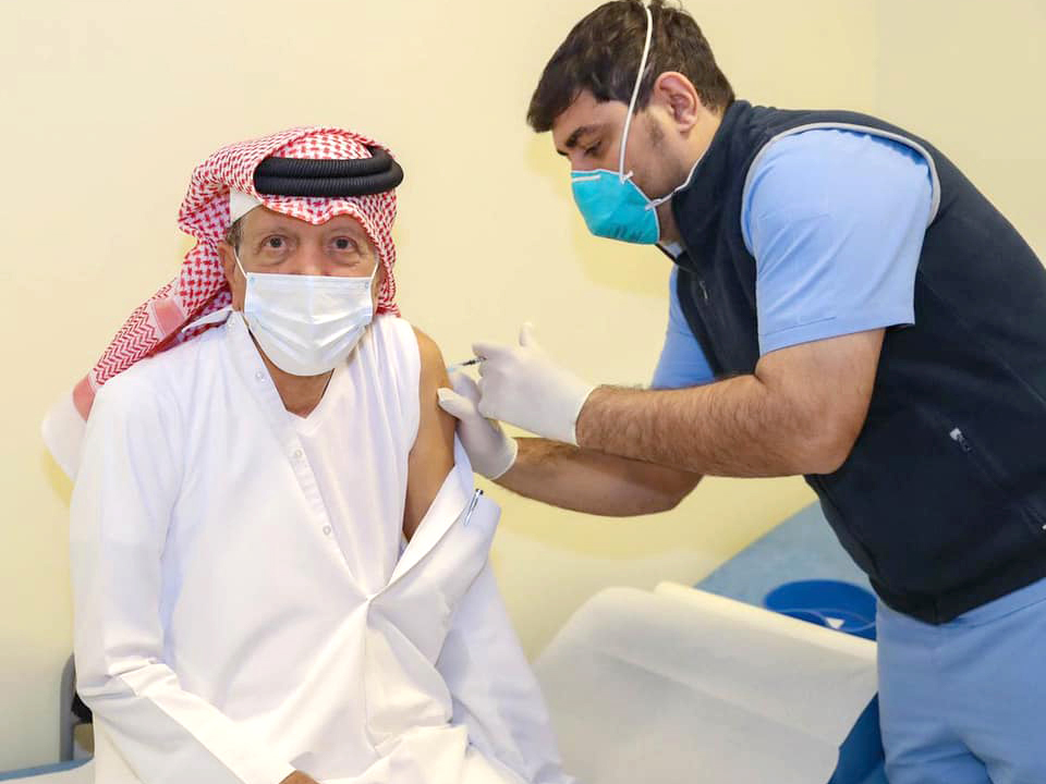 H E Dr. Youssef Hussein Kamal receiving the first dose of the COVID-19 vaccine on Thursday.