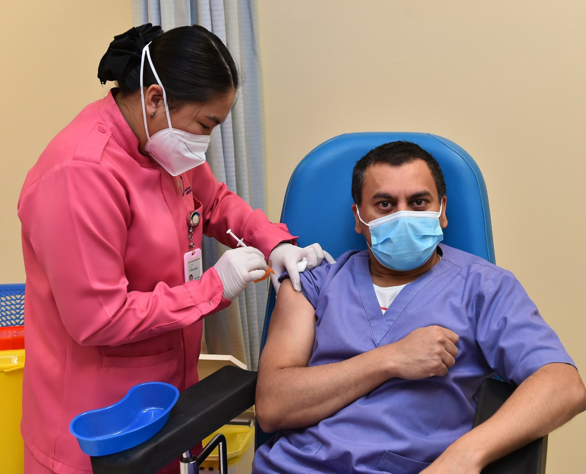 File picture of Covid-19 vaccine being administered in the first phase of vaccination drive in Qatar 