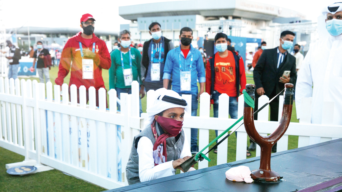 People taking part in a range of activities at the Fan Zone.