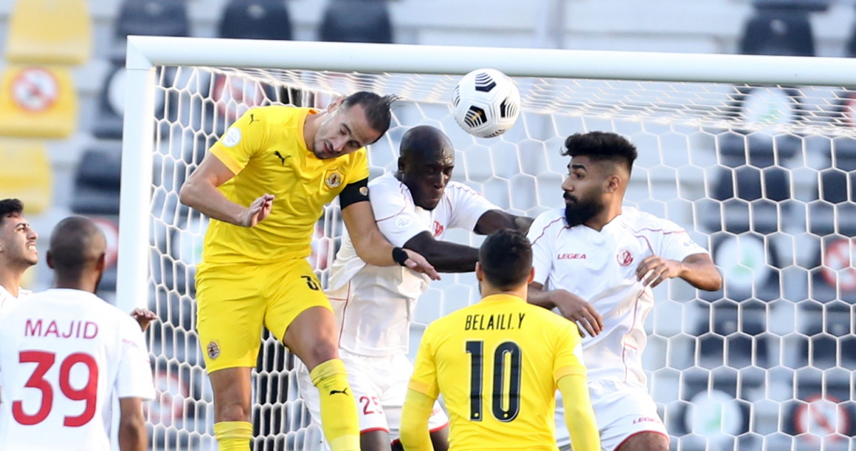 Qatar SC  captain Alejandro Jimena (left) vies for the ball with Al Shamal's Yannick Sagbo during their Amir Cup Round of 16 match played at Qatar SC Stadium. Picture: Hussein Sayed