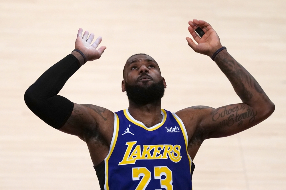 Los Angeles Lakers forward LeBron James (23) gestures in the first half against the Portland Trail Blazers at Staples Center. 