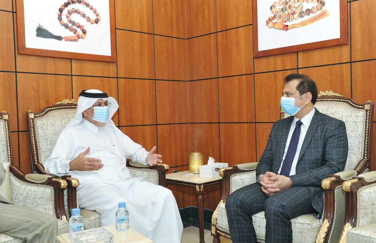 Deputy CEO of Dar Al Sharq Group, Jaber Al Harami (left), with the Regional Director of Lulu Hypermarkets in Qatar, Shaijan M O, at Dar Al Sharq office in Doha.  Pic: Salim Matramkot/The Peninsula