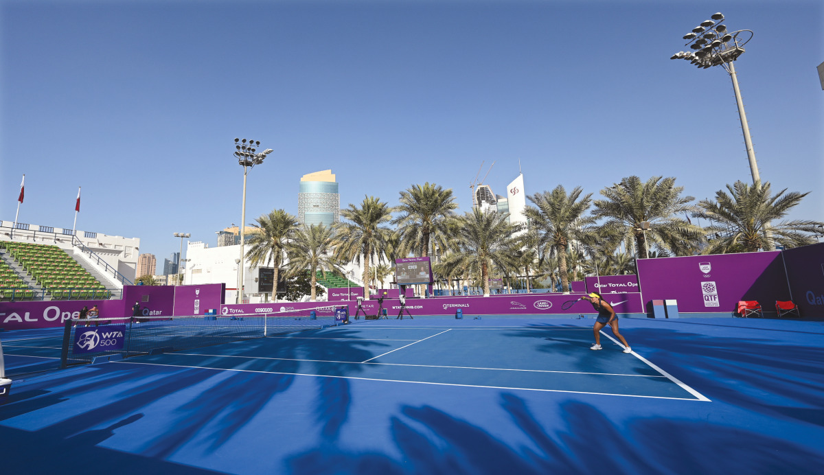 Players in action during a qualifying round match at the Khalifa International Tennis & Squash Complex, yesterday.