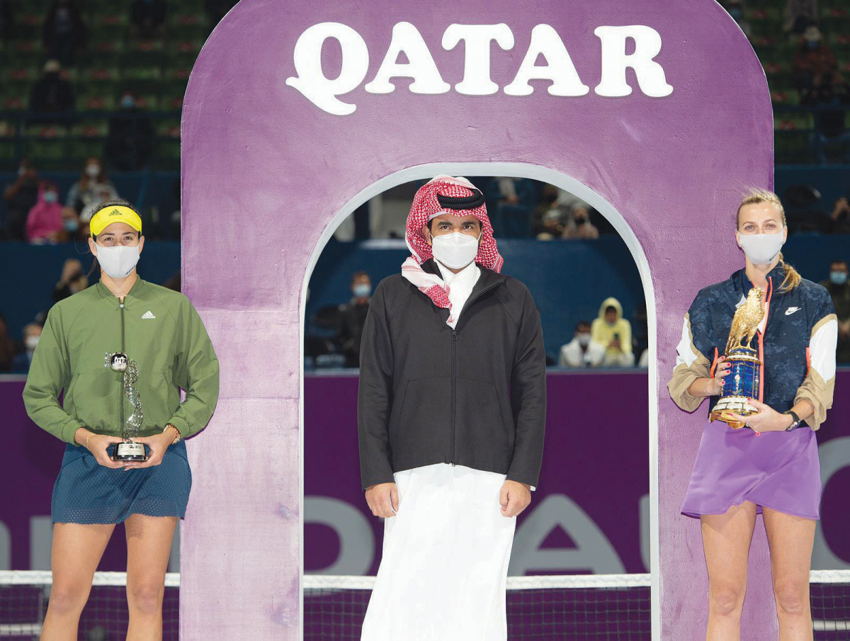 H E Sheikh Joaan bin Hamad Al Thani, President of the Qatar Olympic Committee, with the Qatar Total Open champion Petra Kvitova (right) of Czech Republic and runner-up Garbine Muguruza of Spain at the Khalifa International Tennis and Squash Complex yester