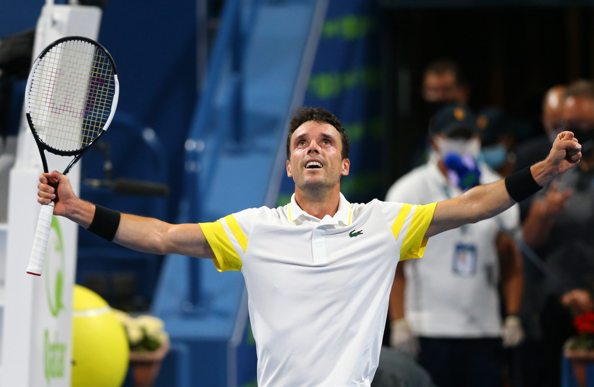 Roberto Bautista Agut of Spain celebrates hits victory against Russia's Andrey Rublev during their semi-final match of the Qatar ExxonMobil Open at the Khalifa International Tennis and Squash Complex in Doha yesterday.