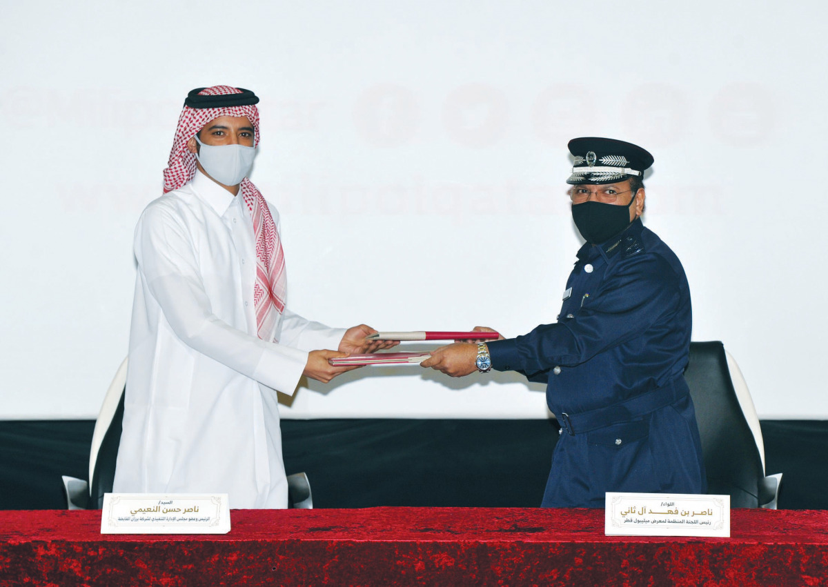 Major General Nasser bin Fahd Al Thani, Chairman of the Milipol Qatar Committee (right); and Nasser Hassan Al Naimi, President and Executive Board Member of Barzan Holdings, at the MoU signing ceremony. PIC: ABDUL BASIT/ THE PENINSULA