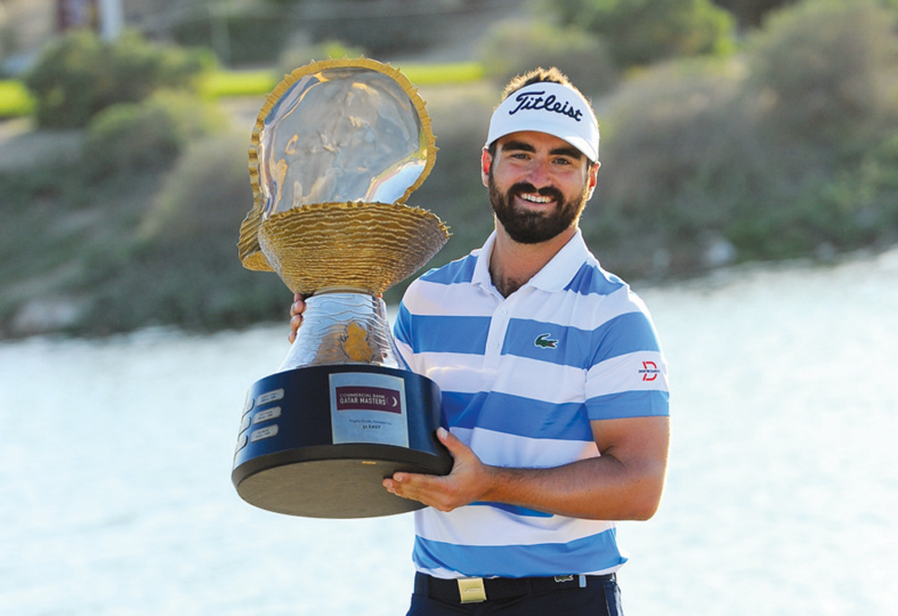 France's Antoine Rozner poses with the Mother of Pearl Trophy after winning the 2021 Commercial Bank Qatar Masters at Education City Golf Club, yesterday.  
Pic: Ebrahim Kutty