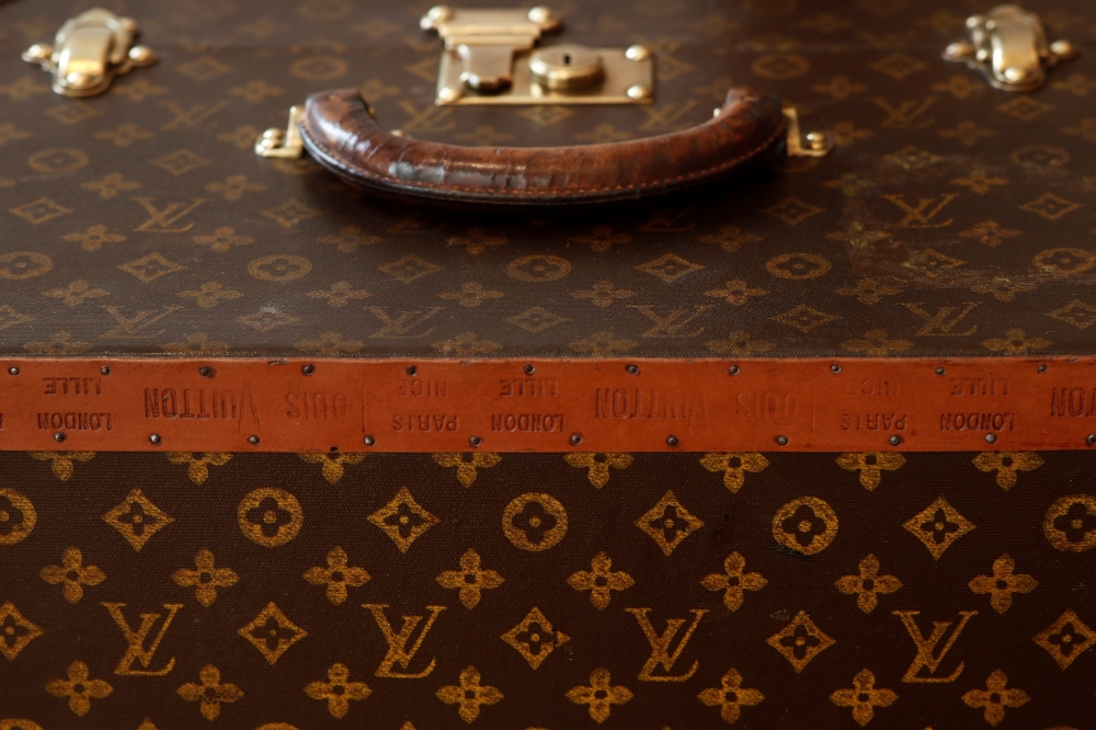 A vintage Louis Vuitton trunk is pictured at the Gros & Delettrez auction house in Paris, France, April 1, 2021. Picture taken April 1, 2021. REUTERS/Benoit Tessier