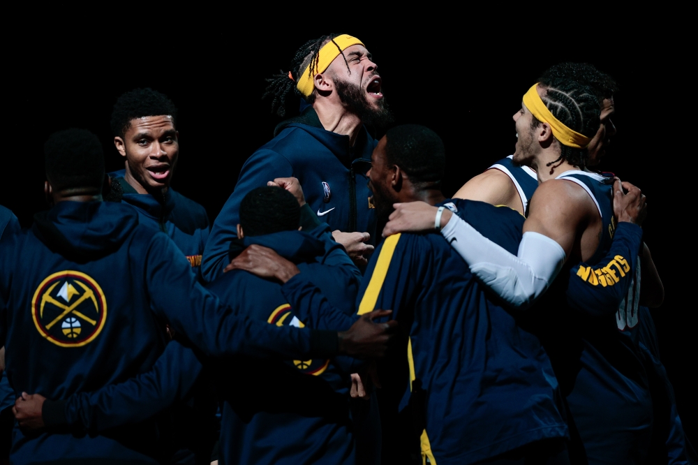 Denver Nuggets center JaVale McGee (34) with teammates before the game against the Memphis Grizzlies at Ball Arena. Isaiah J. Downing