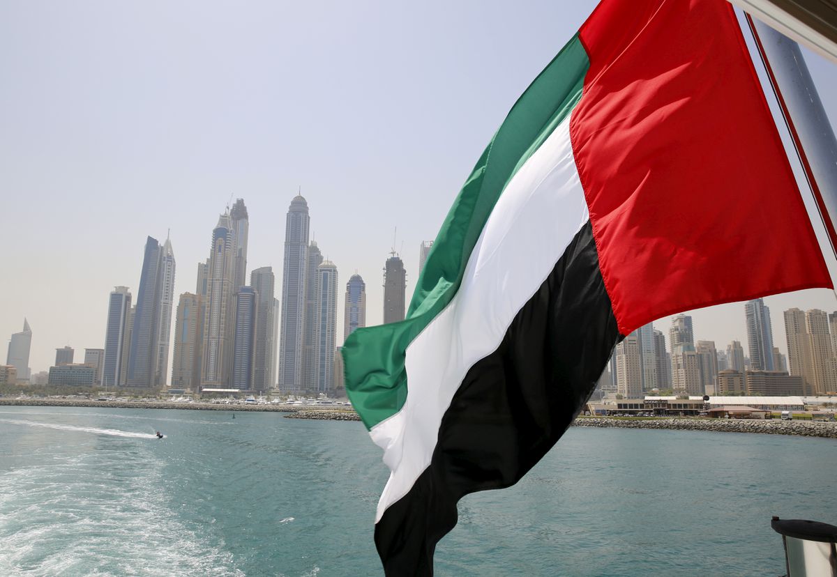 UAE flag flies over a boat at Dubai Marina, Dubai, United Arab Emirates. Reuters/Ahmed Jadallah