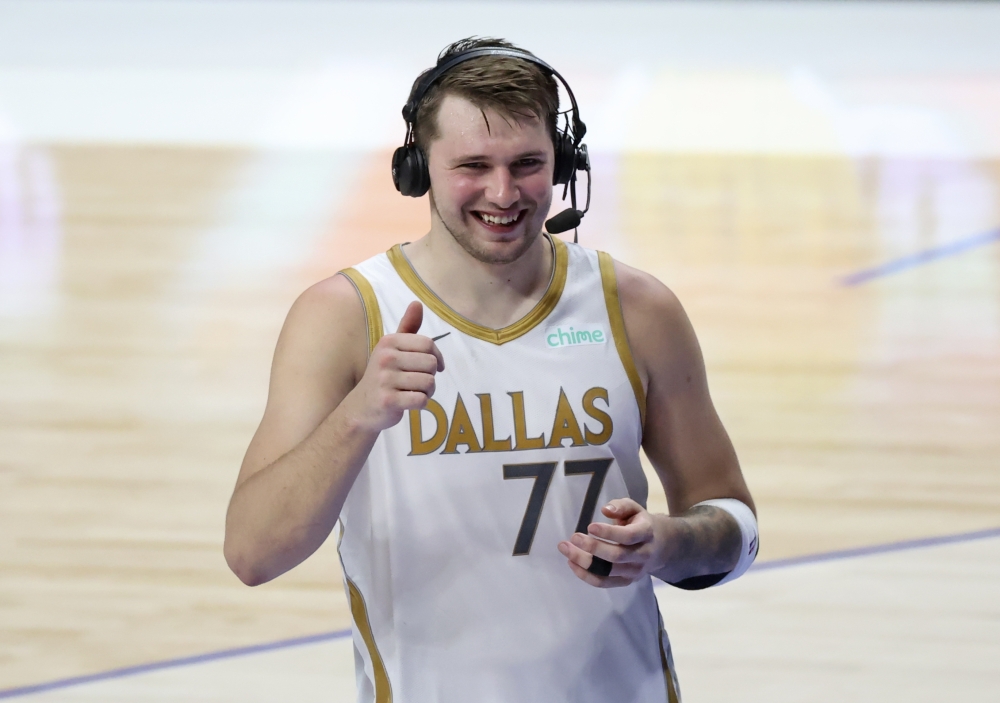 Dallas Mavericks guard Luka Doncic (77) reacts during an interview after the game against the Brooklyn Nets at American Airlines Center. Kevin Jairaj