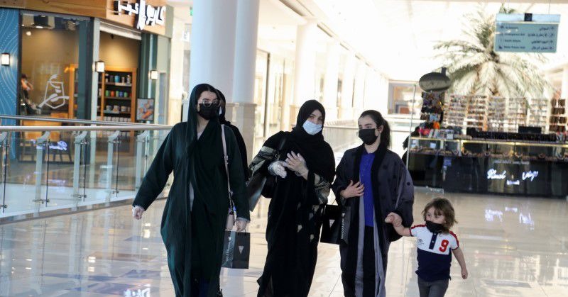 Women wear face masks as they walk at the Hayat mall after restaurants and malls reopened as the government eases the coronavirus lockdown restrictions, in Riyadh, Saudi Arabia June 1, 2020. REUTERS/Ahmed Yosri