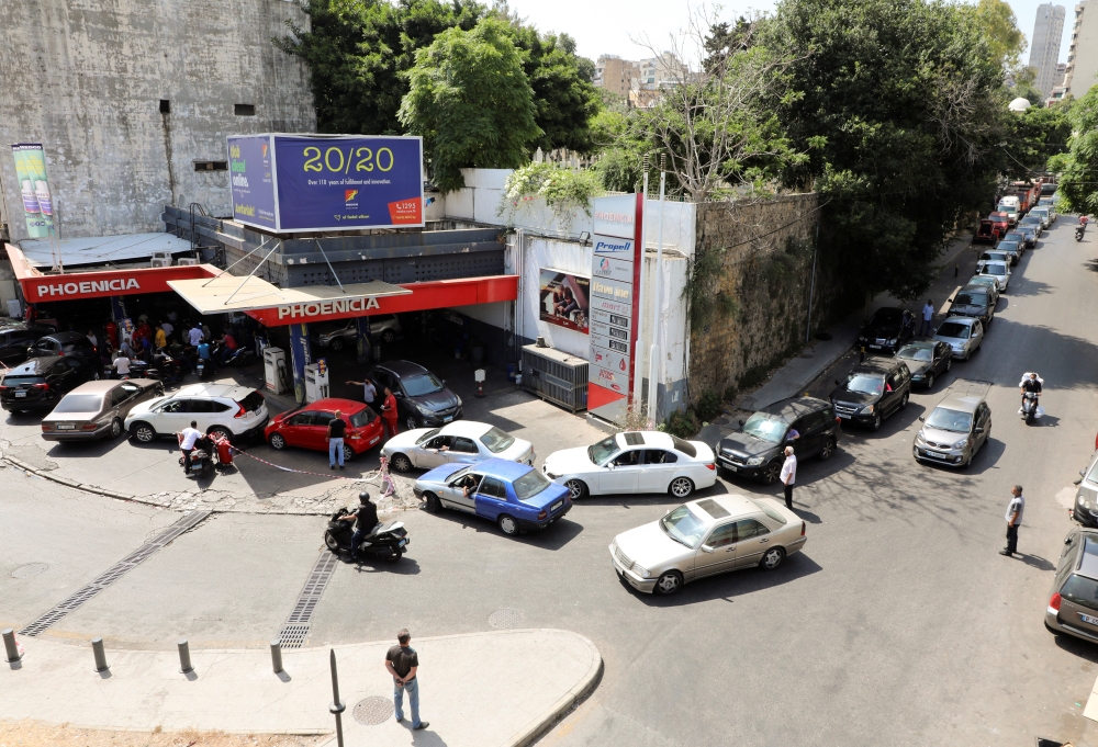 Vehicles stand in line for fuel at a gas station in Beirut, Lebanon on June 10, 2021. (REUTERS/Mohamed Azakir)