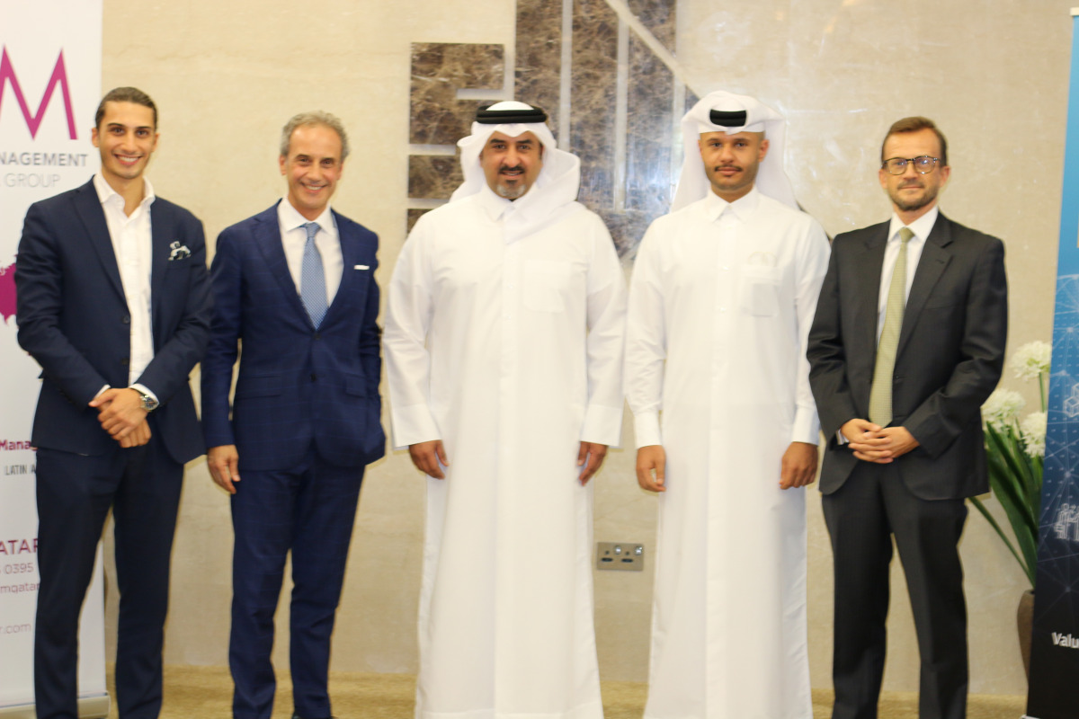 Officials pose for a group photo during the event.