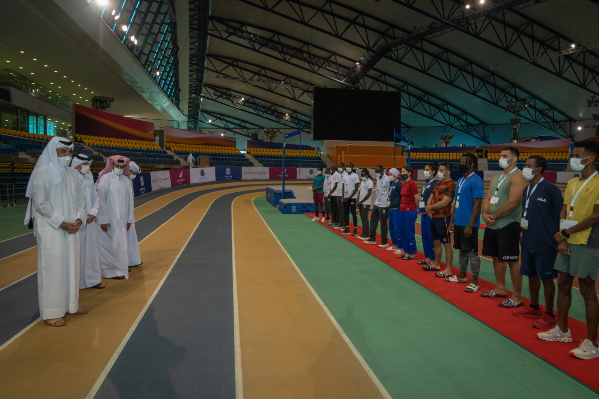 The Qatar Olympic Committee President H E Sheikh Joaan bin Hamad Al Thani speaks with athletes and officials of the Refugee Olympic Team on the final day of their training camp at Aspire Dome.   